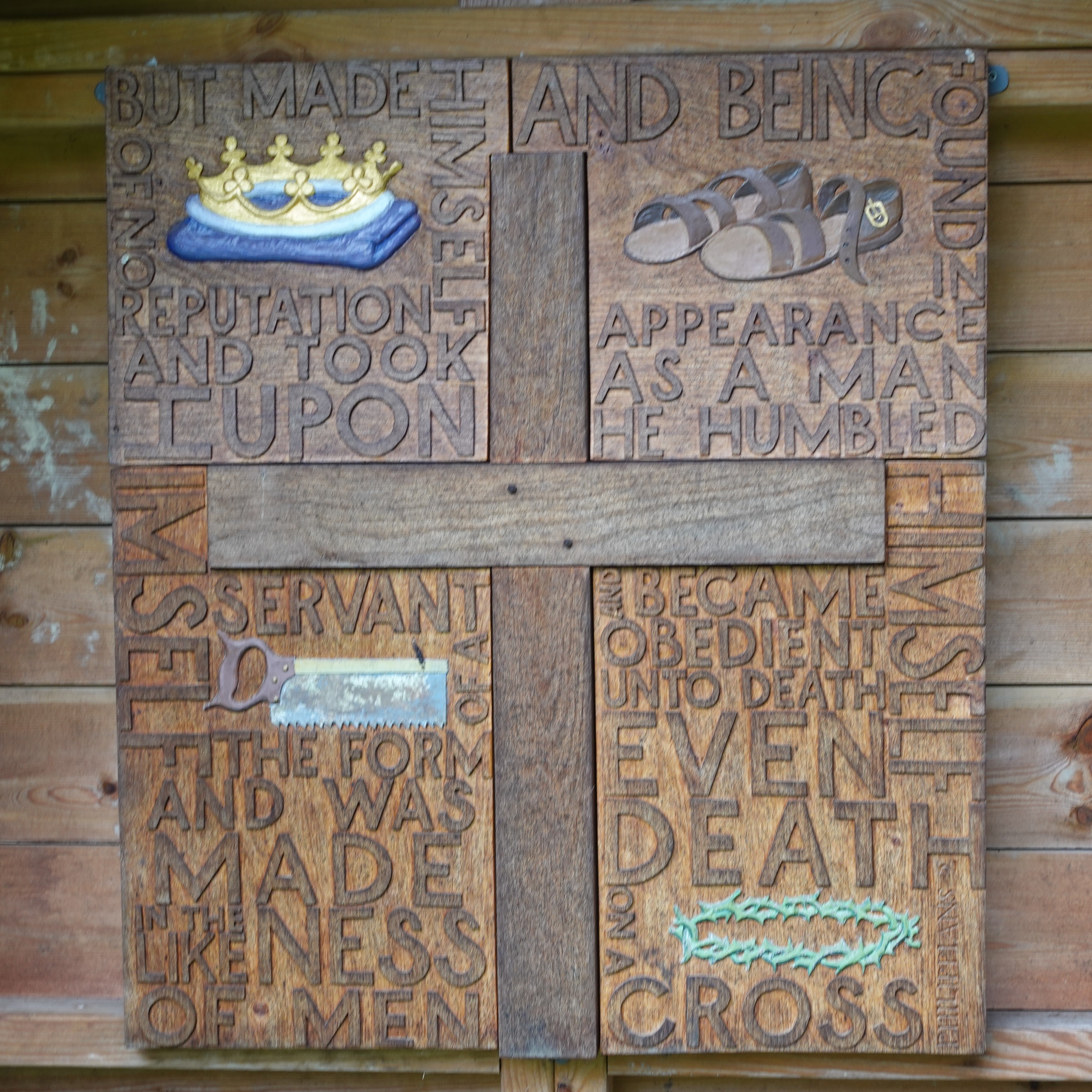 ferrar house retreat centre wooden cross with inscription